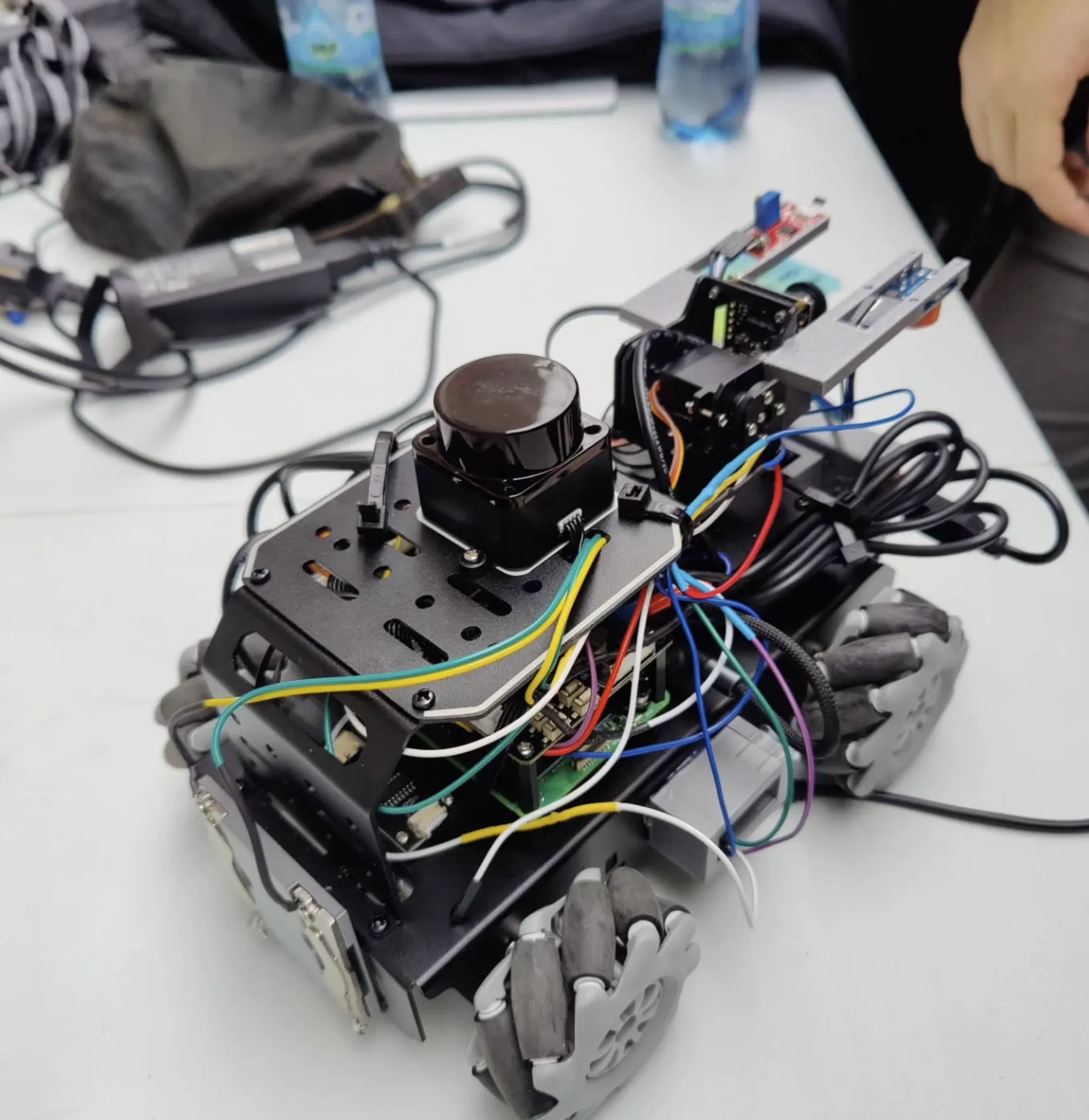 Robot Maze Solver: Raspberry Pi 5 chassis with LiDAR, camera mount, and mecanum wheels
